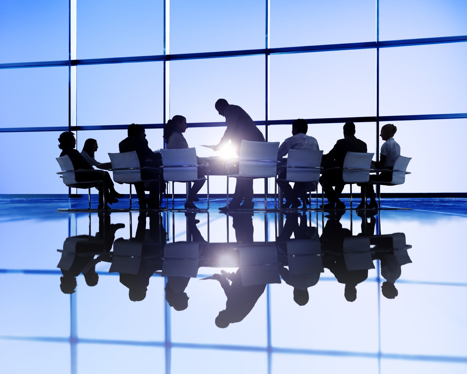 An experienced business team collaborating around a conference table